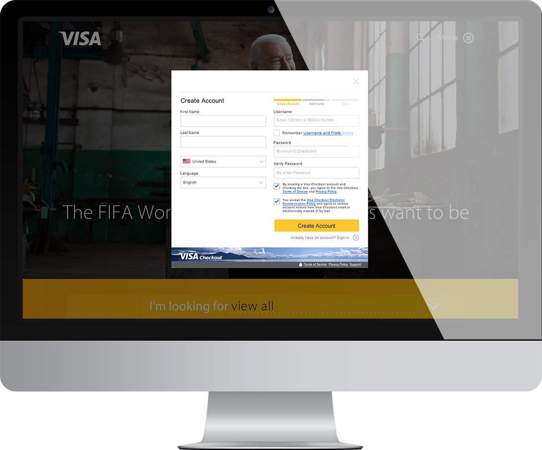 A computer monitor displaying a Visa Checkout enrollment form.